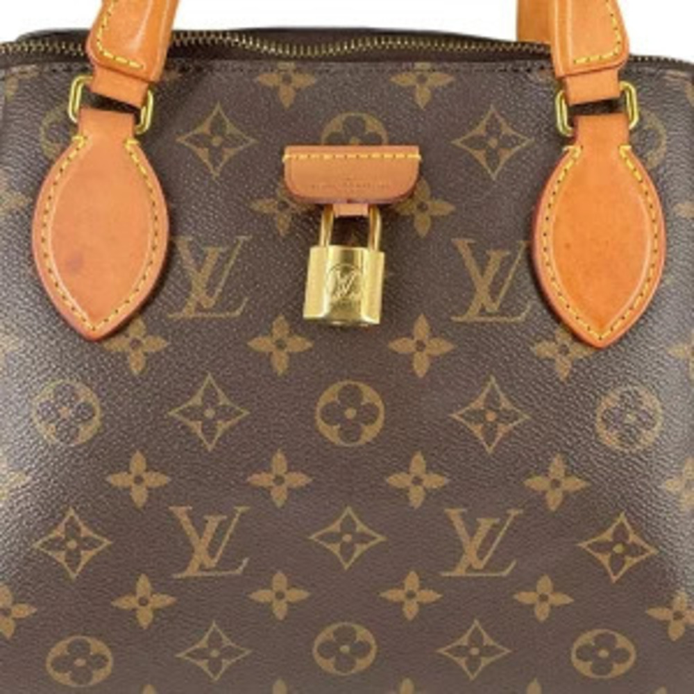 LOUIS VUITTON Monogram Rivoli - Picture 3 of 8